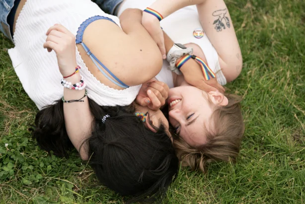 Couple laying together discussing emotions and relationship connection